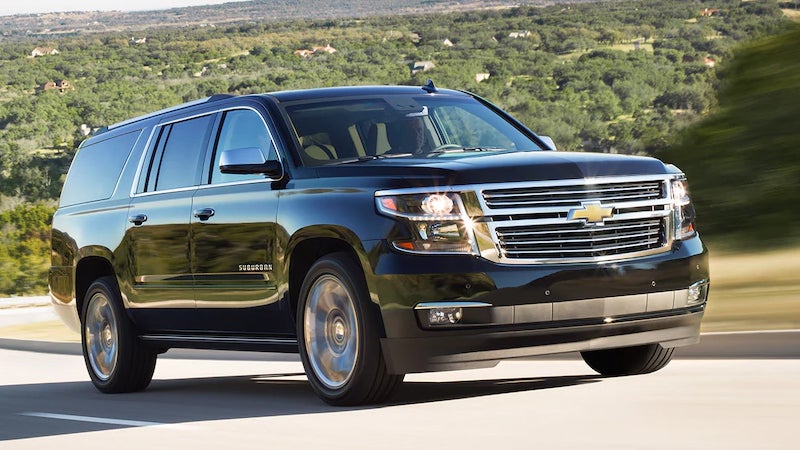 Chevrolet Suburban driving on road